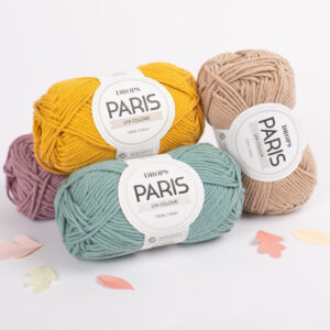 Quatre pelotes superposées de Drops Paris